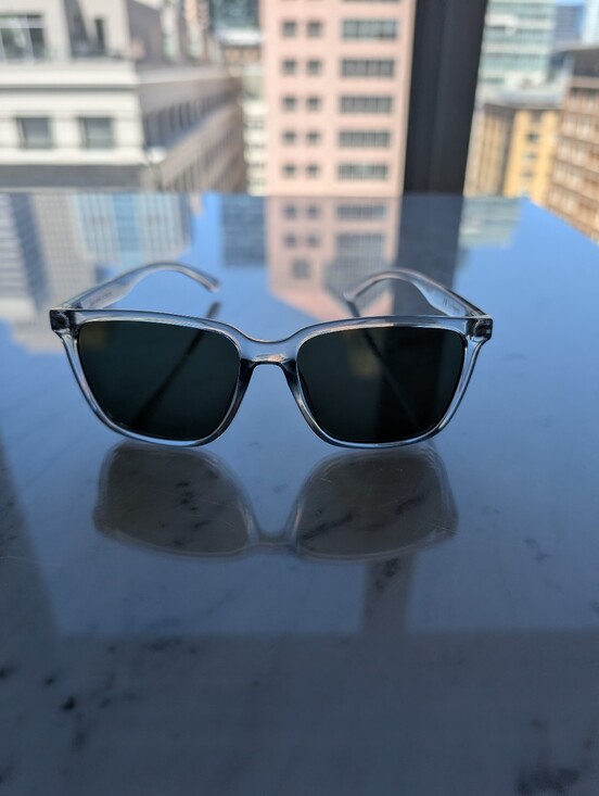 Le Specs Fair Game Sunglasses – Crystal Clear Frame / Black Lenses - Unisex